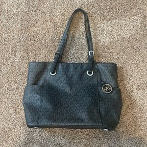 Black Michael Kors purse.